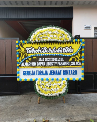 Papan Bunga Duka di Karame